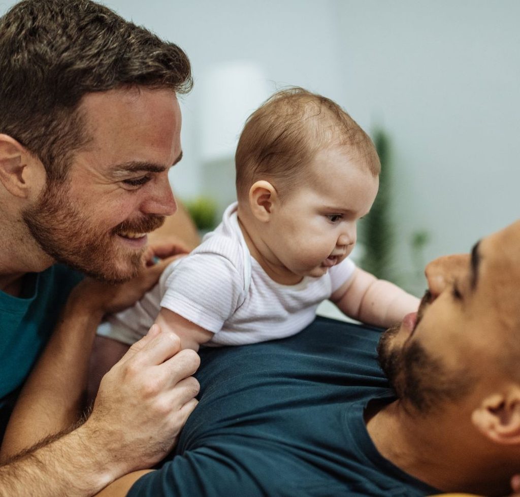 Adoptive parents with their baby